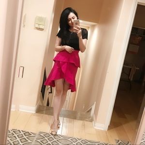 rose red mid skirt. Never wear it. 
New with tag.